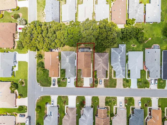 5507 Laver St, Leesburg, FL 34748 - aerial view of property and surrounding area featuring nearby suburban area and property parcel outlined