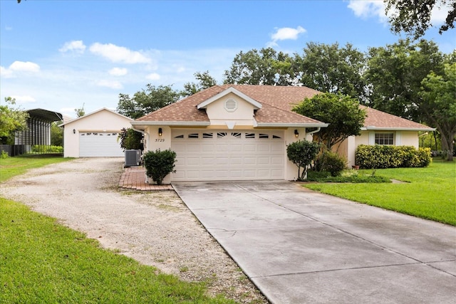5729 Bible Camp Rd, Groveland, FL 34736 - ranch-style home with stucco siding, a front lawn, a garage, a detached carport, and driveway