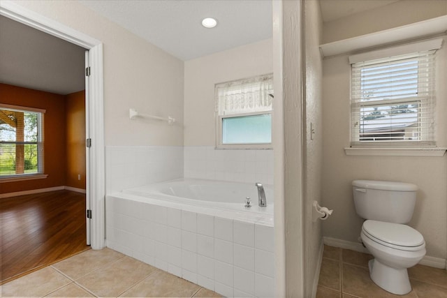 5729 Bible Camp Rd, Groveland, FL 34736 - full bath with a garden tub and tile patterned floors