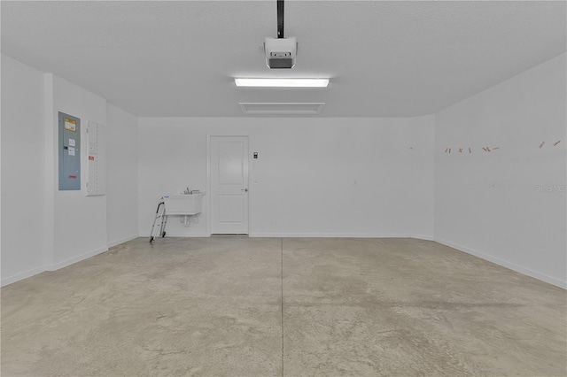 3283 Dawn Pl, The Villages, FL 32163 - garage with electric panel and a garage door opener