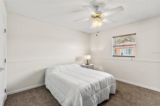 81 N Carol Ave, Mascotte, FL 34753 - carpeted bedroom featuring a textured ceiling and a ceiling fan