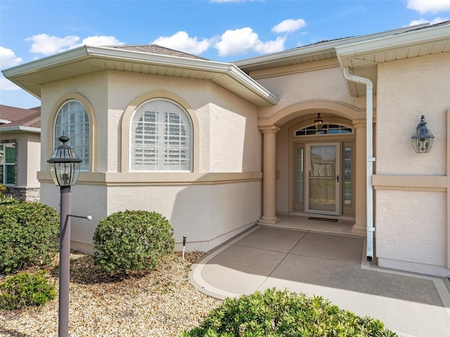 10927 SE 168th Loop, Summerfield, FL 34491 - property entrance featuring stucco siding