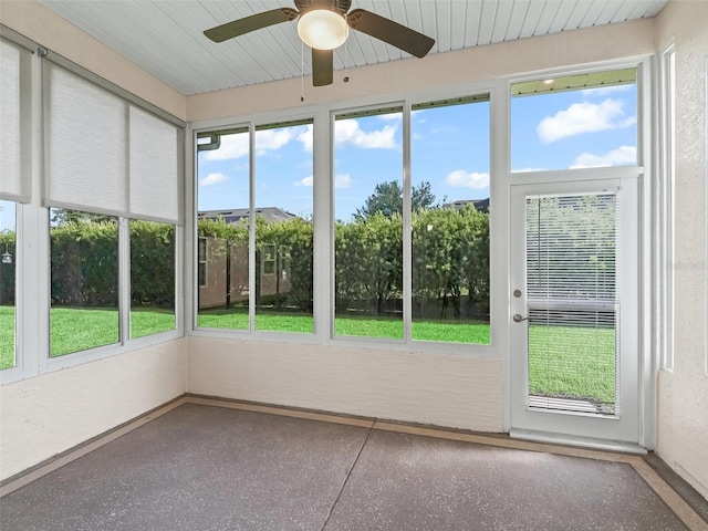 10927 SE 168th Loop, Summerfield, FL 34491 - unfurnished sunroom featuring a ceiling fan and plenty of natural light