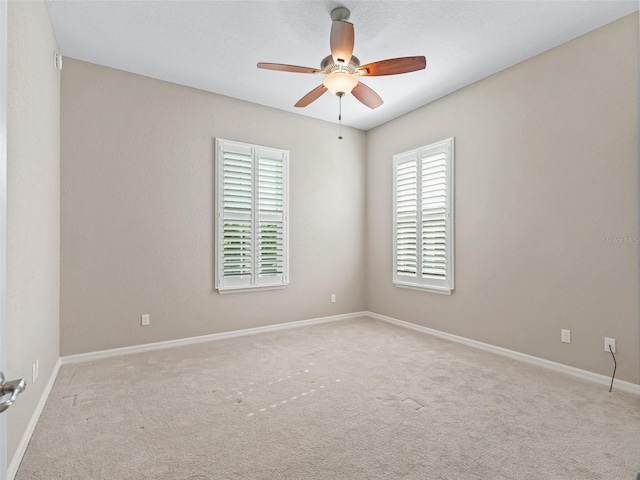 10927 SE 168th Loop, Summerfield, FL 34491 - unfurnished room featuring a ceiling fan and carpet