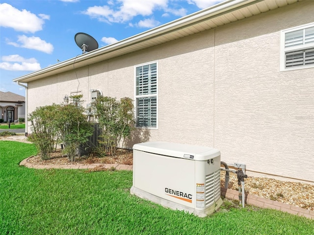 10927 SE 168th Loop, Summerfield, FL 34491 - view of home's exterior featuring stucco siding and a yard