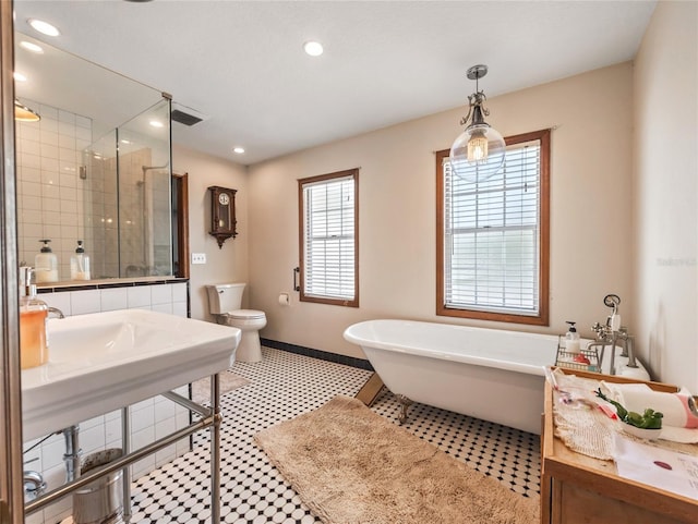 15733 Tower View Dr, Clermont, FL 34711 - bathroom featuring a soaking tub, a shower stall, recessed lighting, and tile patterned floors