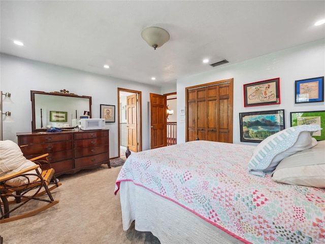 15733 Tower View Dr, Clermont, FL 34711 - bedroom with recessed lighting, light carpet, and a closet
