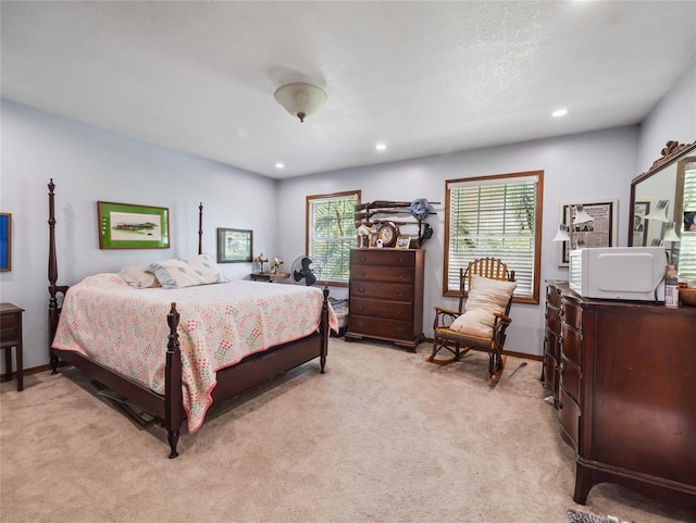 15733 Tower View Dr, Clermont, FL 34711 - bedroom featuring light colored carpet, multiple windows, and recessed lighting