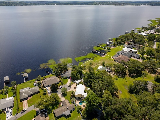 15733 Tower View Dr, Clermont, FL 34711 - aerial overview of property's location with a large body of water and nearby suburban area