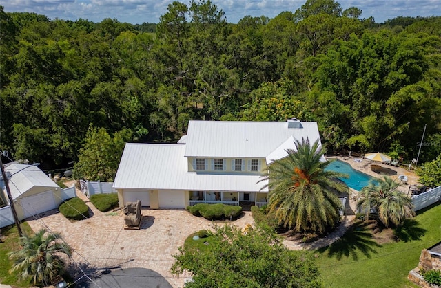 15733 Tower View Dr, Clermont, FL 34711 - aerial view of property and surrounding area featuring a heavily wooded area and a pool