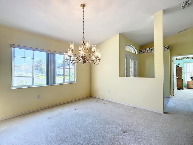 13700 SE 90th Ct, Summerfield, FL 34491 - carpeted spare room with baseboards and a chandelier