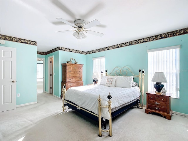 13700 SE 90th Ct, Summerfield, FL 34491 - carpeted bedroom featuring baseboards and a ceiling fan