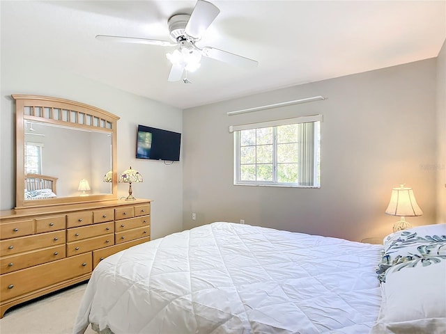13700 SE 90th Ct, Summerfield, FL 34491 - carpeted bedroom with a ceiling fan