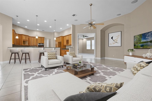 7303 Spring Mountain Ln, Yalaha, FL 34797 - living area featuring light tile patterned floors, a ceiling fan, and recessed lighting