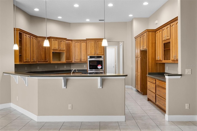 7303 Spring Mountain Ln, Yalaha, FL 34797 - kitchen featuring open shelves, dark countertops, stainless steel oven, a kitchen breakfast bar, and recessed lighting