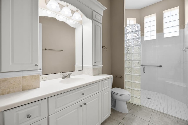 7303 Spring Mountain Ln, Yalaha, FL 34797 - bathroom with a stall shower, vanity, and tile patterned floors