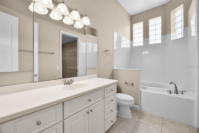 7303 Spring Mountain Ln, Yalaha, FL 34797 - full bath featuring a bath, vanity, and tile patterned floors