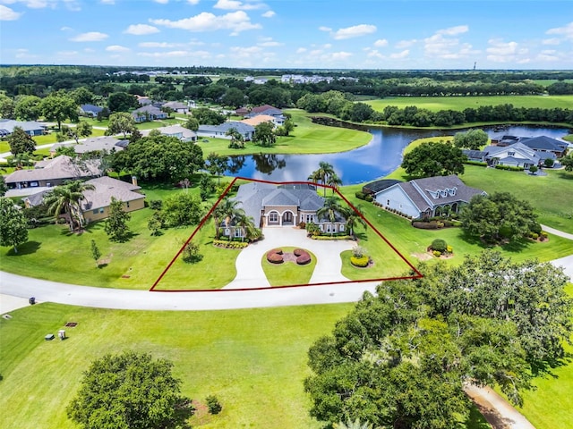 7303 Spring Mountain Ln, Yalaha, FL 34797 - aerial view of residential area with a large body of water and property boundaries highlighted