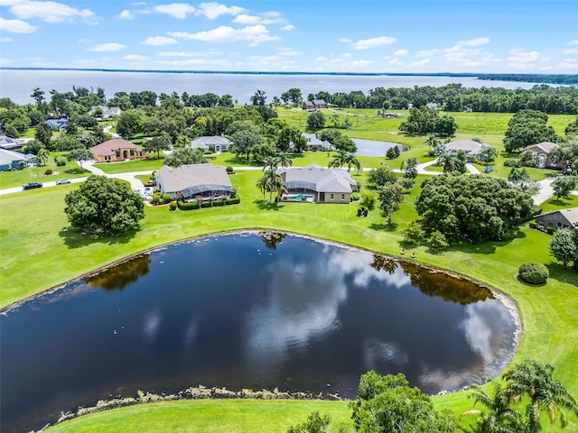 7303 Spring Mountain Ln, Yalaha, FL 34797 - aerial perspective of suburban area featuring a large body of water