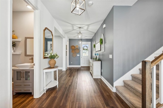 3304 Canna Lily Pl, Clermont, FL 34711 - entryway with dark wood finished floors and stairway