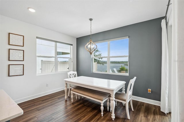 3304 Canna Lily Pl, Clermont, FL 34711 - dining space featuring plenty of natural light, dark wood-type flooring, a chandelier, and recessed lighting