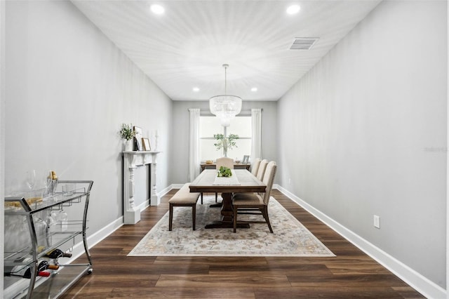 3304 Canna Lily Pl, Clermont, FL 34711 - dining area with recessed lighting, dark wood finished floors, and a chandelier
