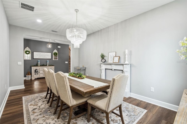 3304 Canna Lily Pl, Clermont, FL 34711 - dining area featuring a chandelier, dark wood-style floors, and recessed lighting