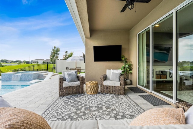 3304 Canna Lily Pl, Clermont, FL 34711 - view of patio featuring a ceiling fan and a pool with connected hot tub