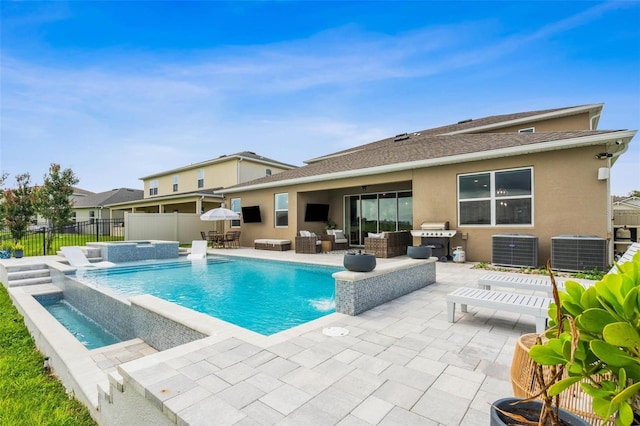 3304 Canna Lily Pl, Clermont, FL 34711 - view of pool featuring a patio area, a pool with connected hot tub, area for grilling, and an outdoor living space