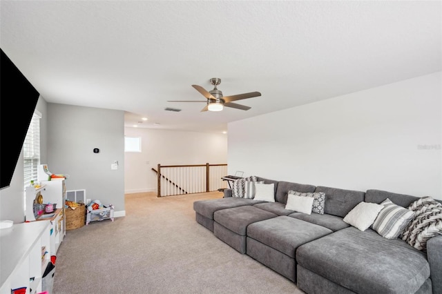 3304 Canna Lily Pl, Clermont, FL 34711 - living area with light colored carpet and ceiling fan