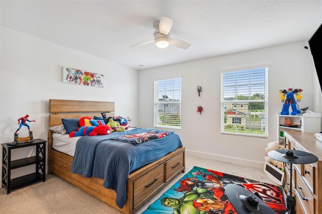 3304 Canna Lily Pl, Clermont, FL 34711 - bedroom with light carpet and ceiling fan