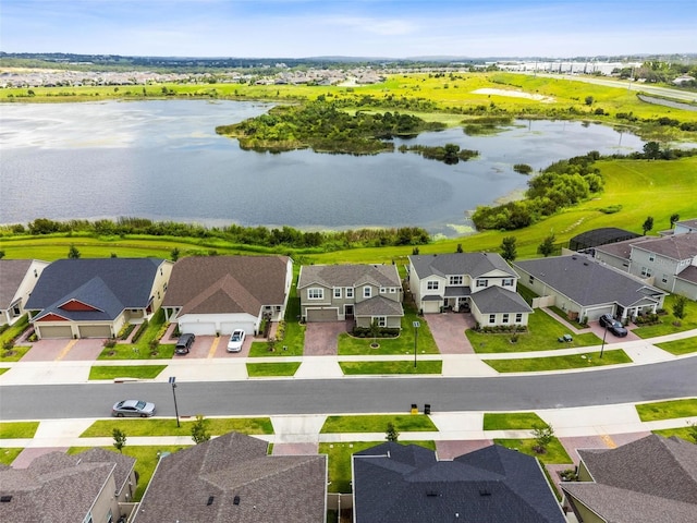 3304 Canna Lily Pl, Clermont, FL 34711 - aerial perspective of suburban area with a nearby body of water