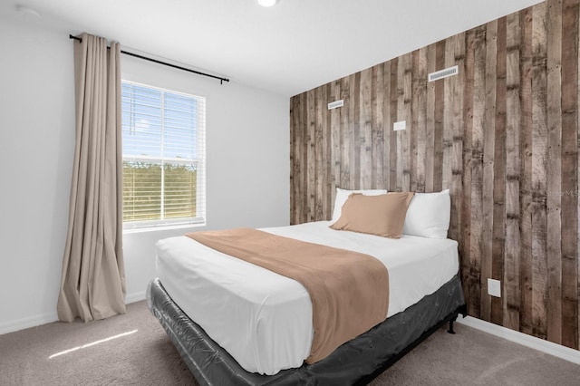 709 Longboat Dr, Davenport, FL 33896 - carpeted bedroom with wooden walls and baseboards