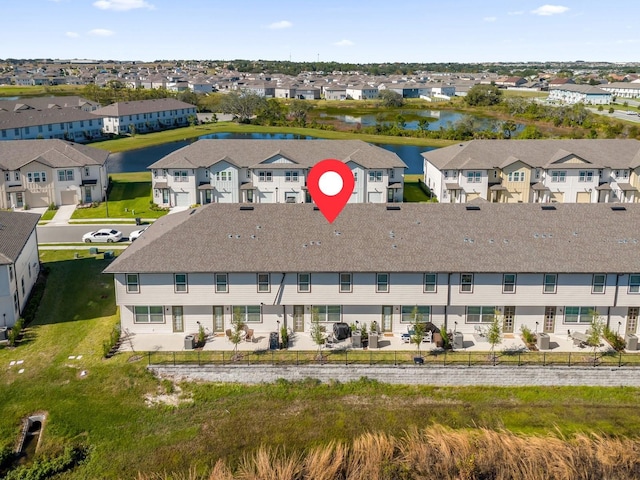 709 Longboat Dr, Davenport, FL 33896 - aerial perspective of suburban area featuring a nearby body of water
