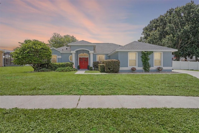 14708 Timucua Pl, Clermont, FL 34711 - view of front of home with stucco siding and roof with shingles