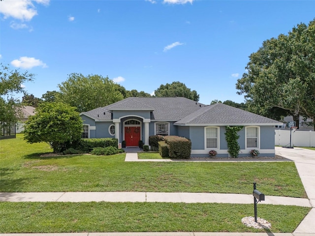 14708 Timucua Pl, Clermont, FL 34711 - single story home with stucco siding and roof with shingles