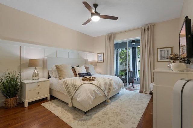 14708 Timucua Pl, Clermont, FL 34711 - bedroom featuring access to exterior, dark wood-style flooring, and ceiling fan