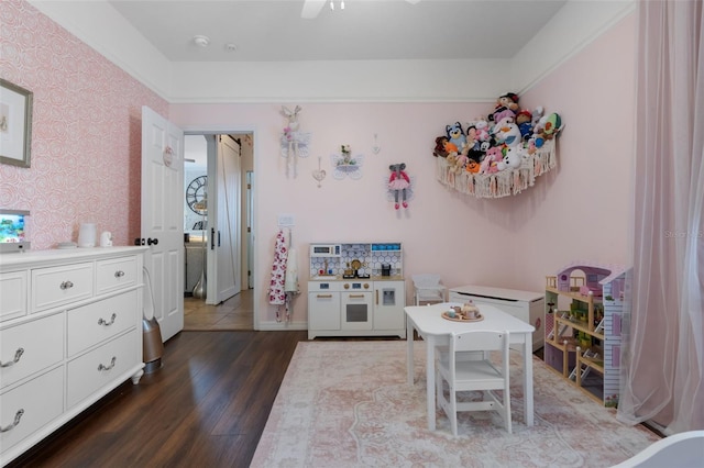14708 Timucua Pl, Clermont, FL 34711 - rec room with dark wood-type flooring and wallpapered walls