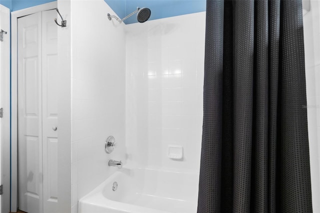 14708 Timucua Pl, Clermont, FL 34711 - full bathroom with shower / tub combo with curtain and a closet