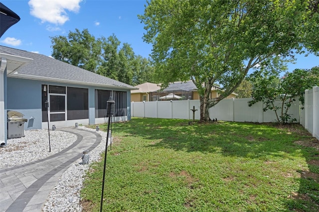 14708 Timucua Pl, Clermont, FL 34711 - fenced backyard with a sunroom
