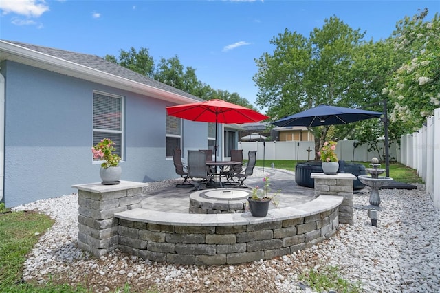 14708 Timucua Pl, Clermont, FL 34711 - fenced backyard with a patio area and outdoor dining space