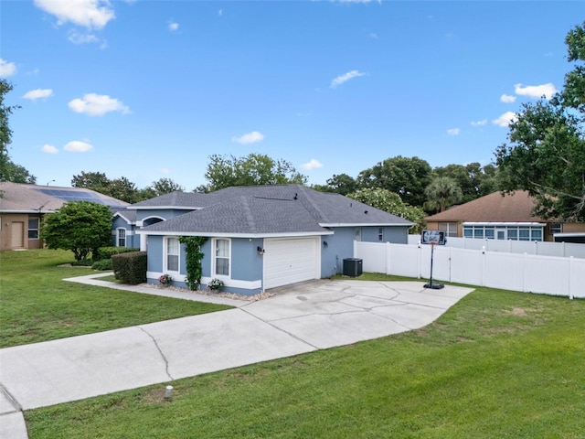 14708 Timucua Pl, Clermont, FL 34711 - back of property with roof with shingles, an attached garage, driveway, and stucco siding