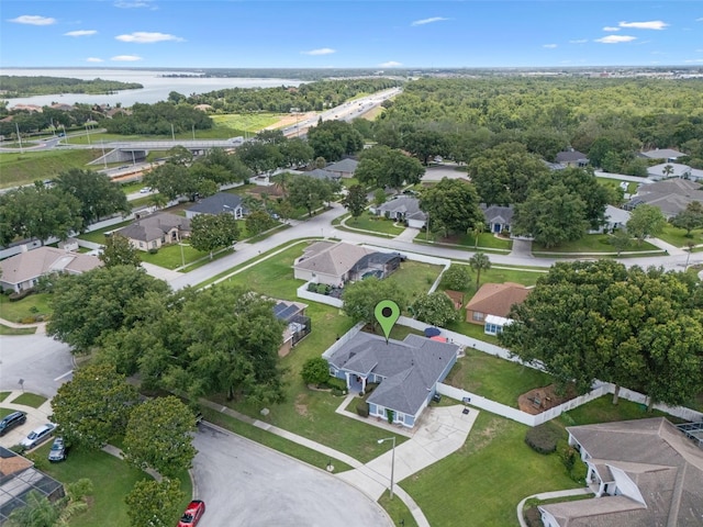 14708 Timucua Pl, Clermont, FL 34711 - aerial perspective of suburban area with a nearby body of water
