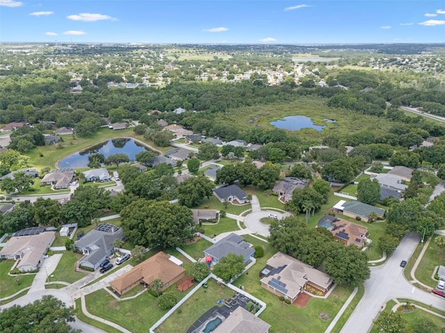 14708 Timucua Pl, Clermont, FL 34711 - view of property location featuring a large body of water and nearby suburban area