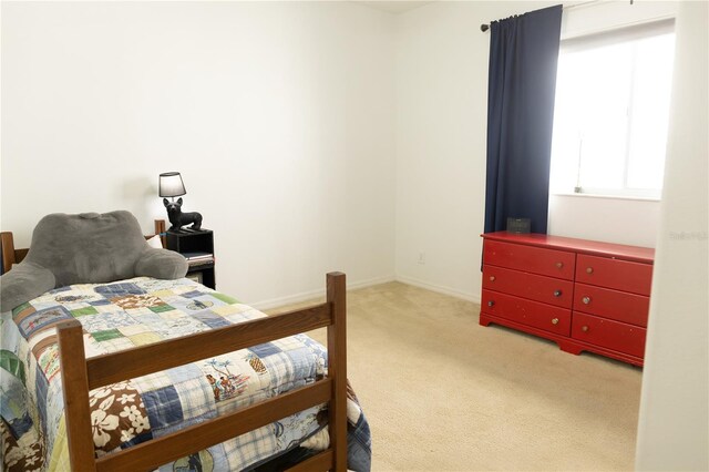26620 Shoregrass Dr, Wesley Chapel, FL 33544 - bedroom with light carpet and baseboards