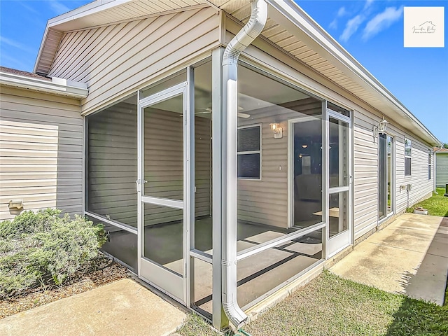2311 Pine Ridge St, The Villages, FL 32162 - view of home's exterior featuring a sunroom