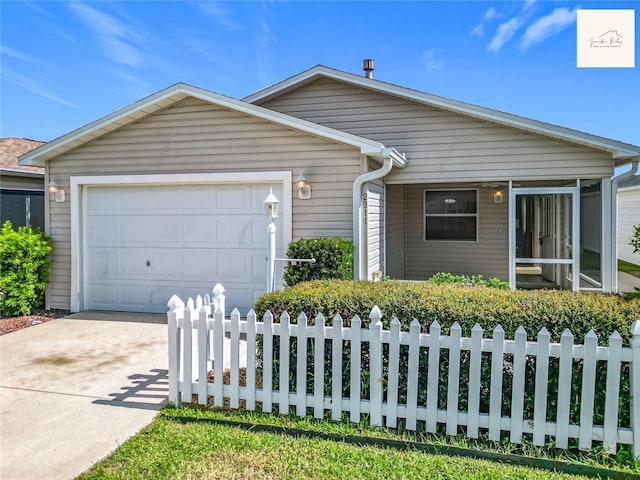 2311 Pine Ridge St, The Villages, FL 32162 - ranch-style home with concrete driveway, an attached garage, and a sunroom
