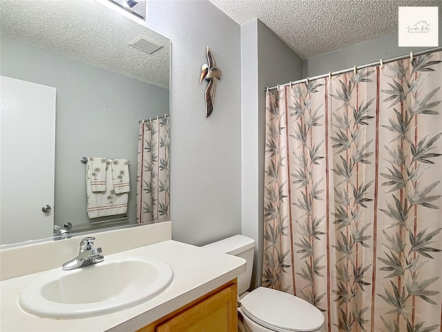 2311 Pine Ridge St, The Villages, FL 32162 - bathroom with a textured ceiling, vanity, and a shower with curtain