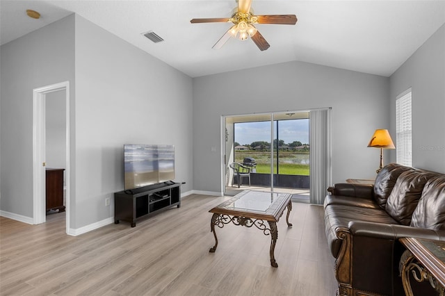 5715 Illumination Ln, Leesburg, FL 34748 - living room featuring a ceiling fan, lofted ceiling, and light wood finished floors