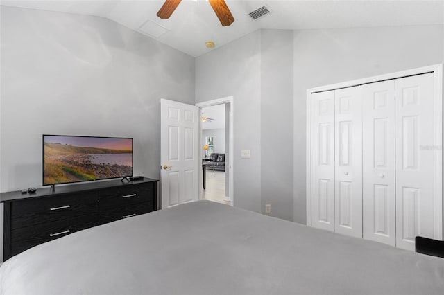 5715 Illumination Ln, Leesburg, FL 34748 - bedroom featuring lofted ceiling, ceiling fan, and a closet